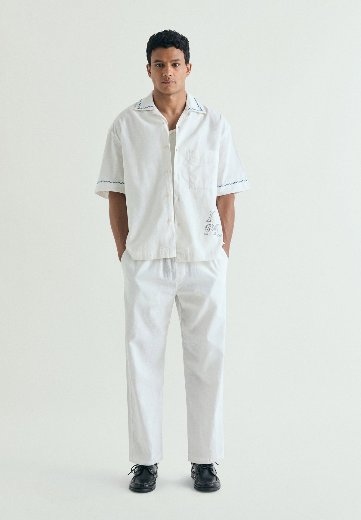 RELAXED LINEN AND COTTON TROUSERS
