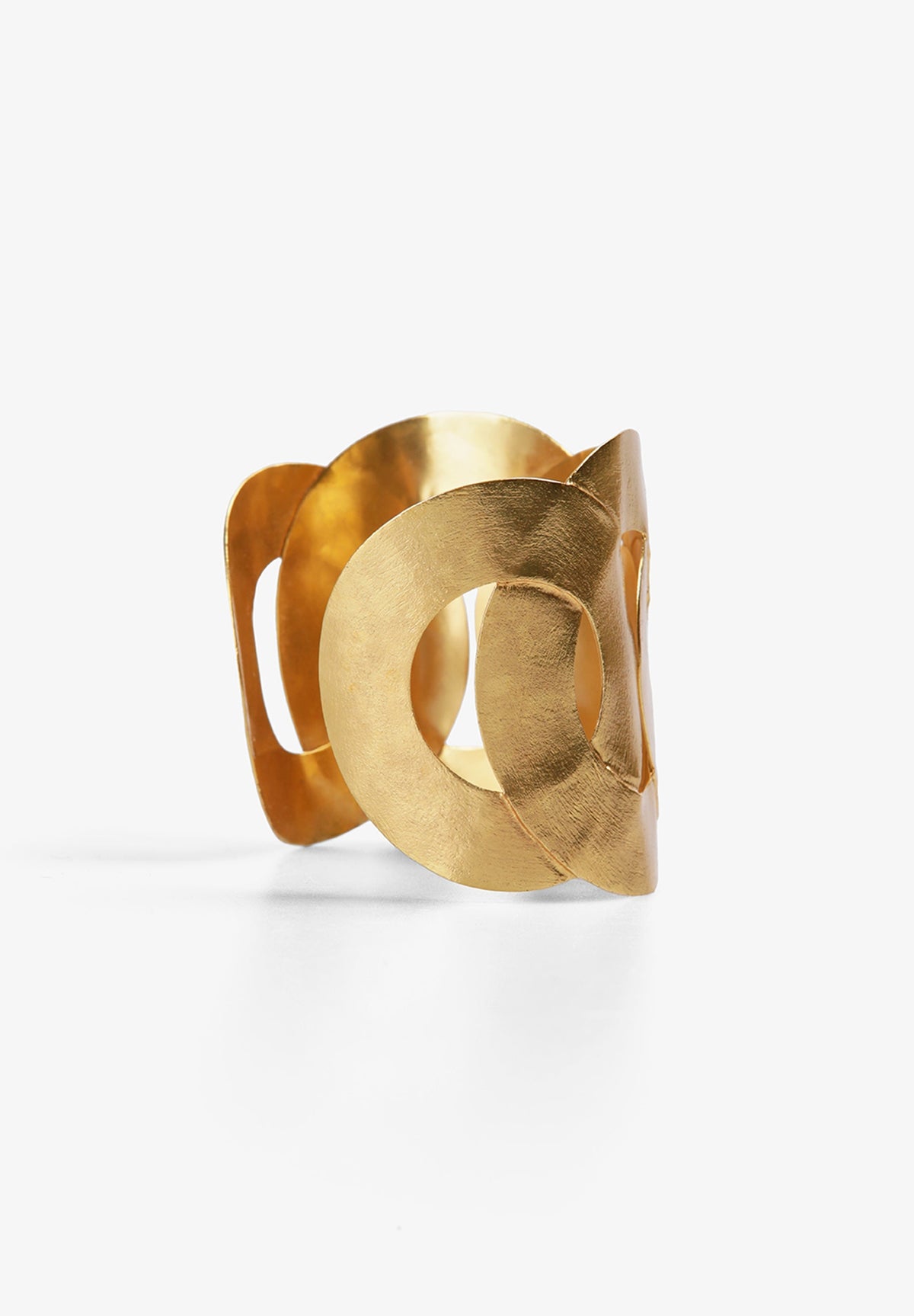 INTERWOVEN GOLD TONE BANGLE